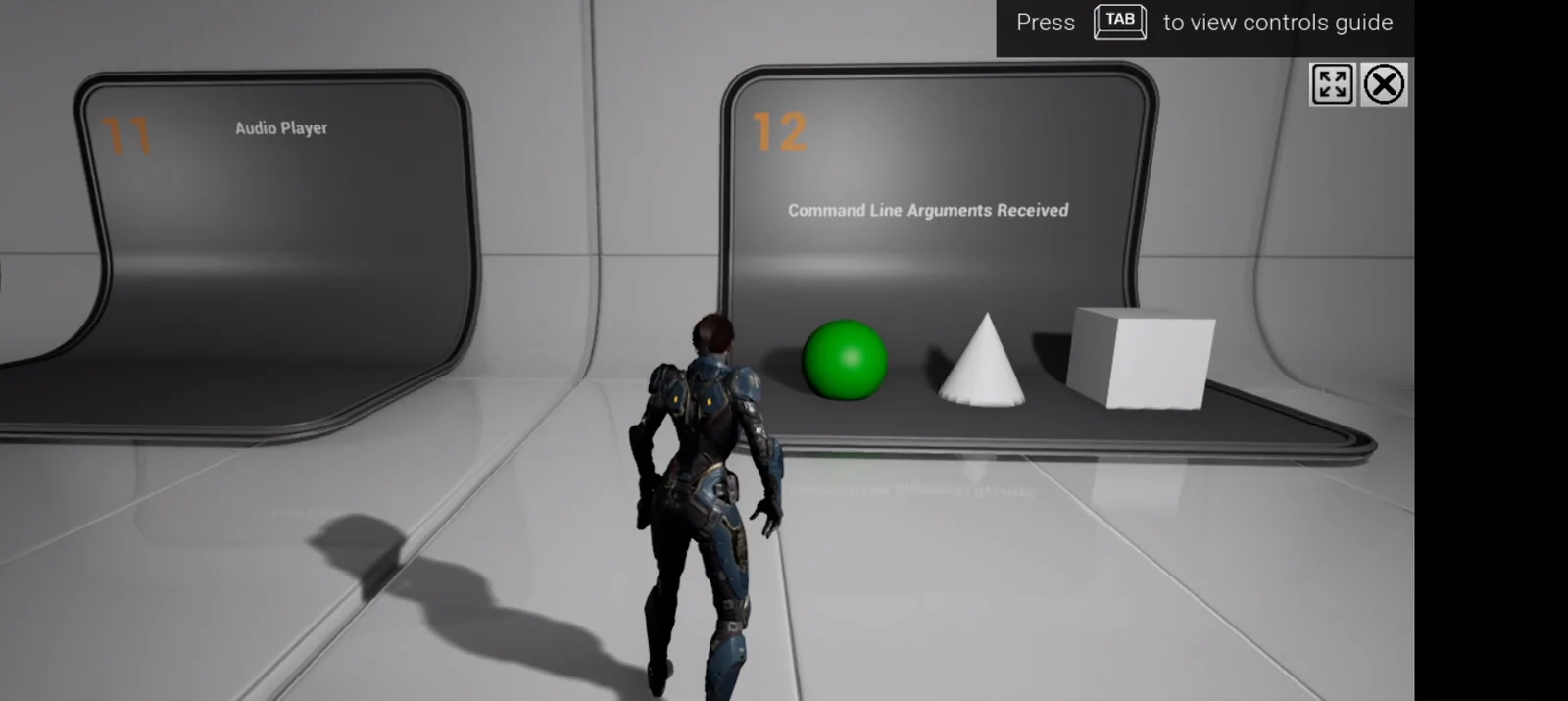 The demo at booth 12 with a green ball, and the cone and box still white
